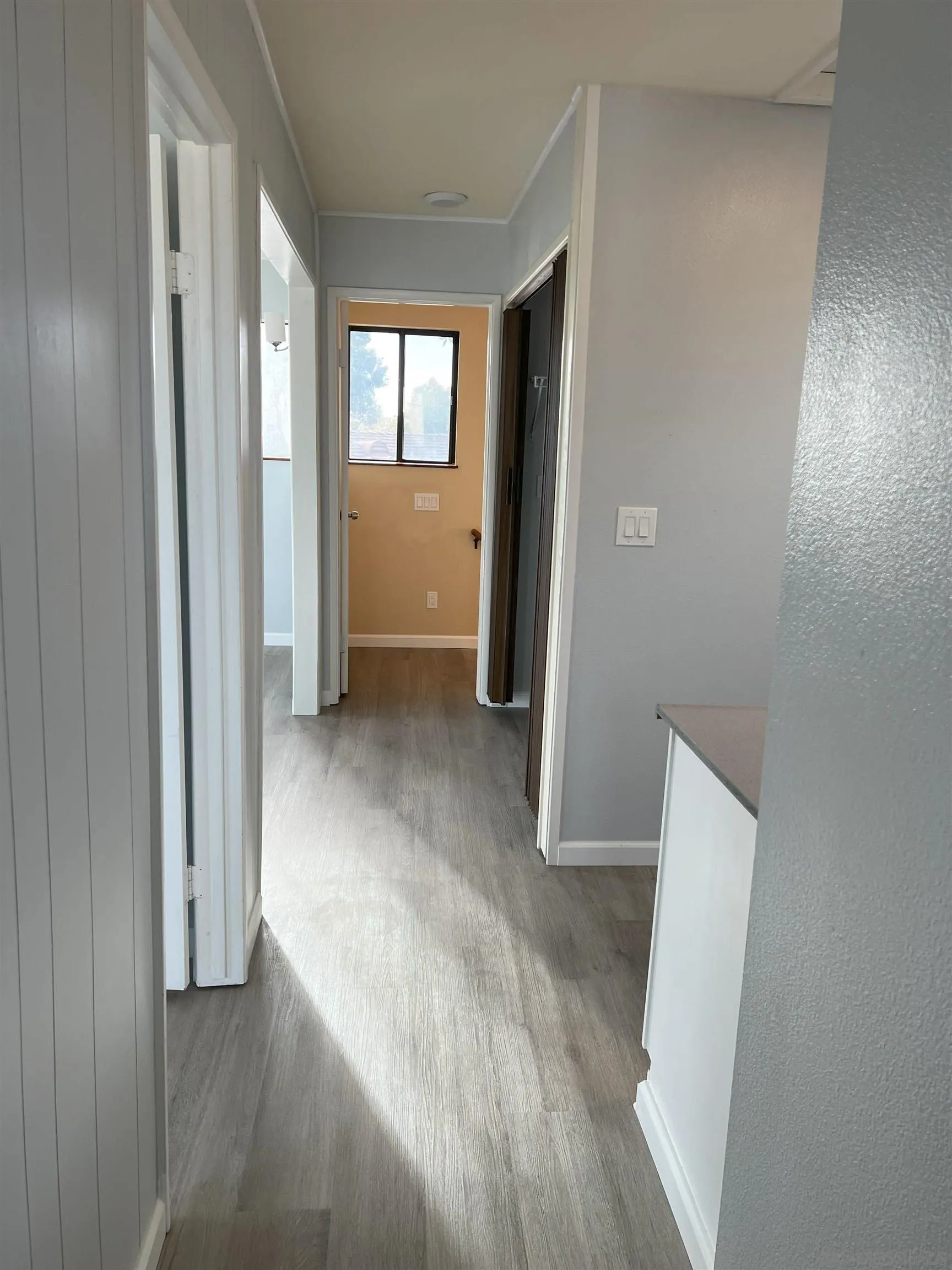 4054 Mt Barnard Avenue San Diego, CA 92111 - Photo 47 of 55 an entryway with wooden floor and a mirror