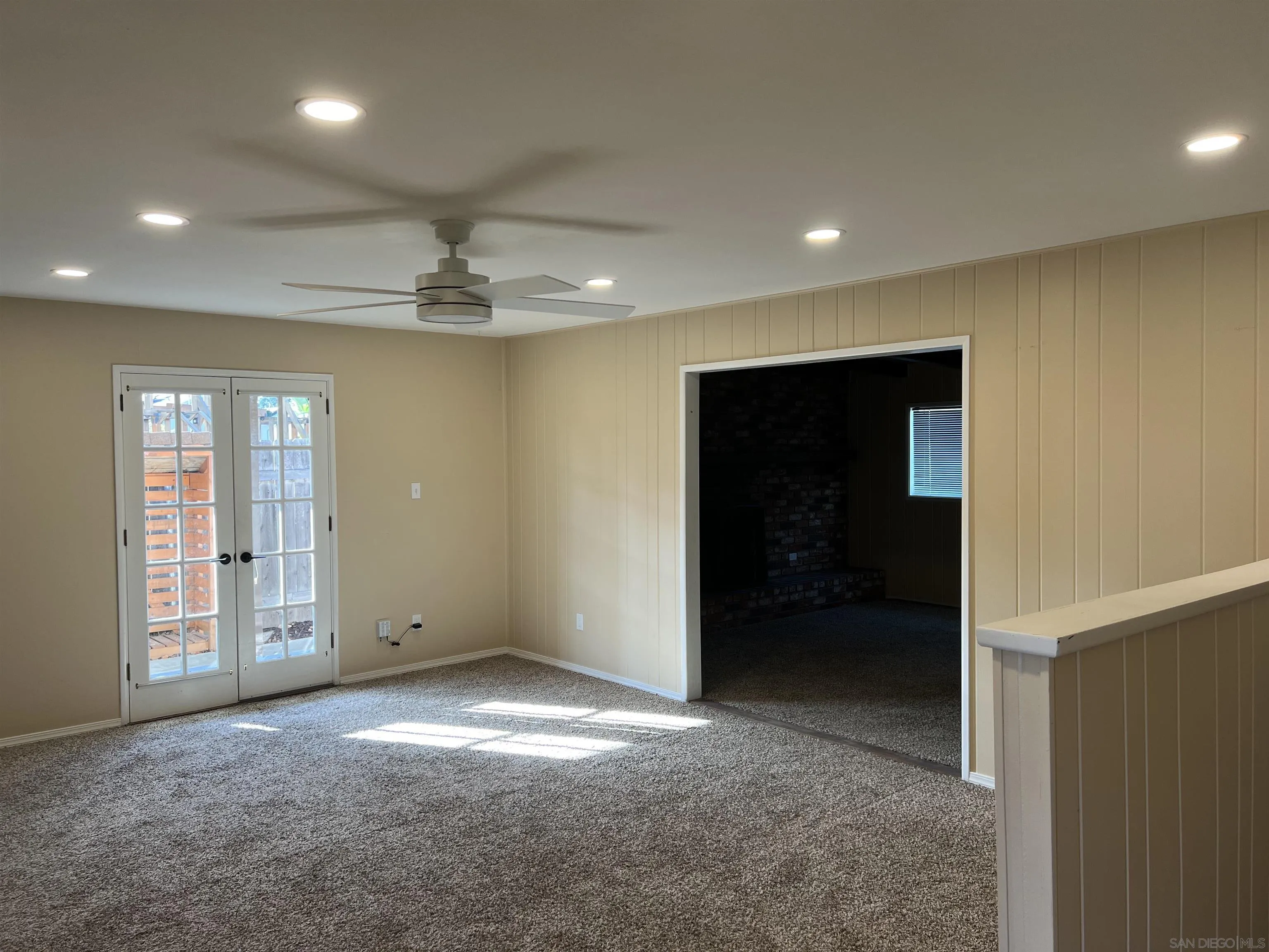 4054 Mt Barnard Avenue San Diego, CA 92111 - Photo 10 of 55 a view of an empty room with a window