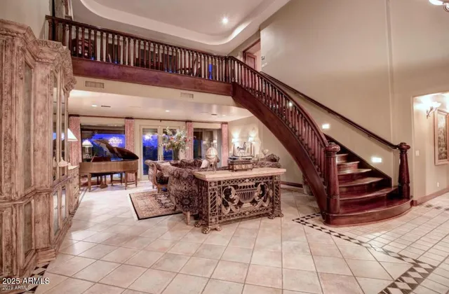 a view of an entryway with a lot of cabinets
