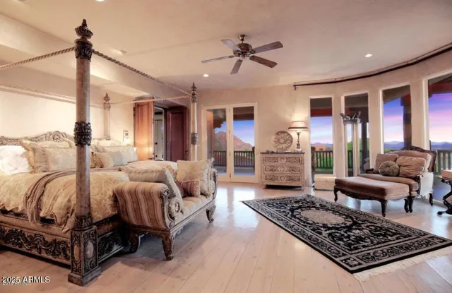 a view of a balcony with a yard