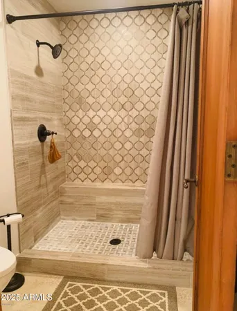 a bathroom with a sink double vanity and a mirror