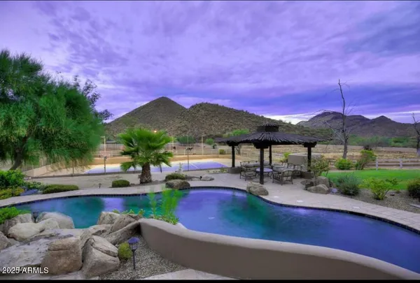 a view of a house with a big yard