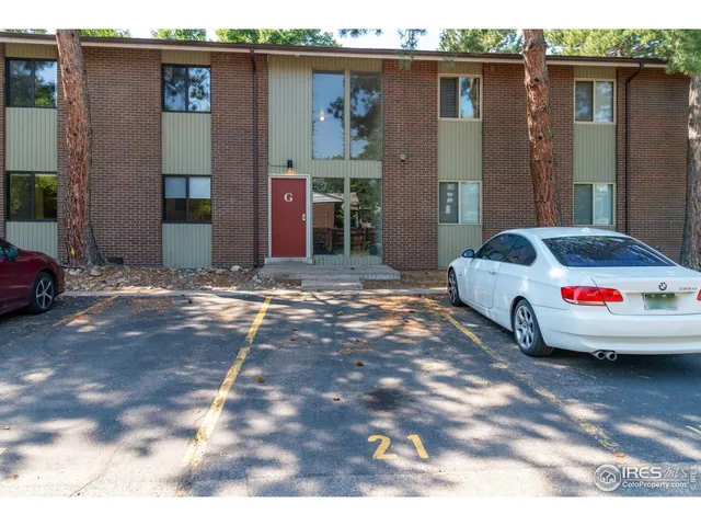 a view of car parked in front of house