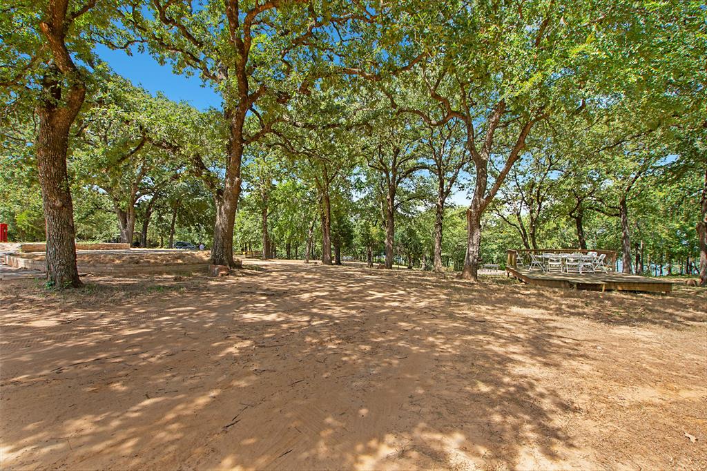 23507 Alexander Road Pilot Point, TX 76258 - Photo 20 of 26 View of yard featuring a wooden deck