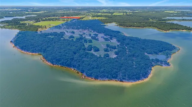 a view of a lake in middle of the town
