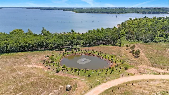 a view of a lake with a building in the background