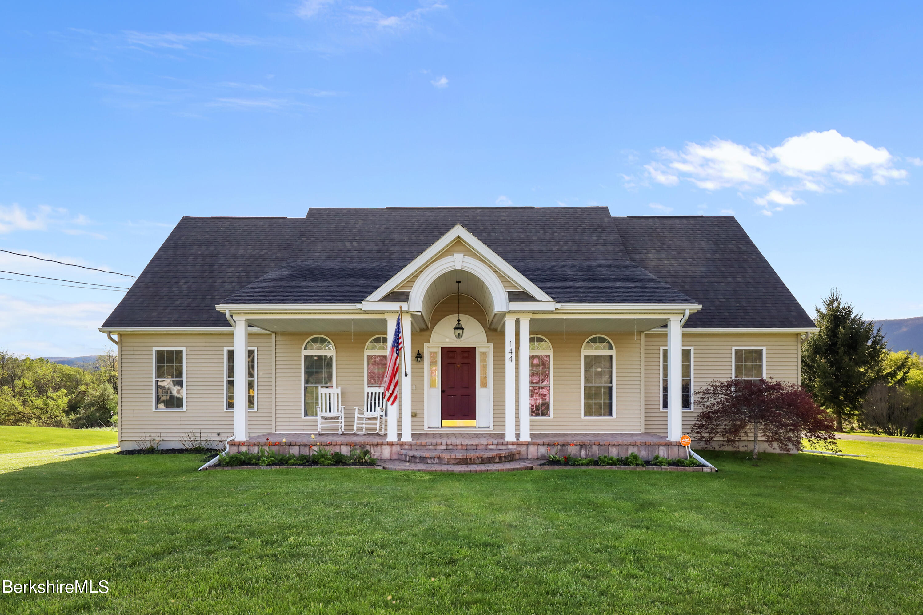 144 East Road Adams, MA 01220 - Photo 1 of 72 a front view of a house with a garden