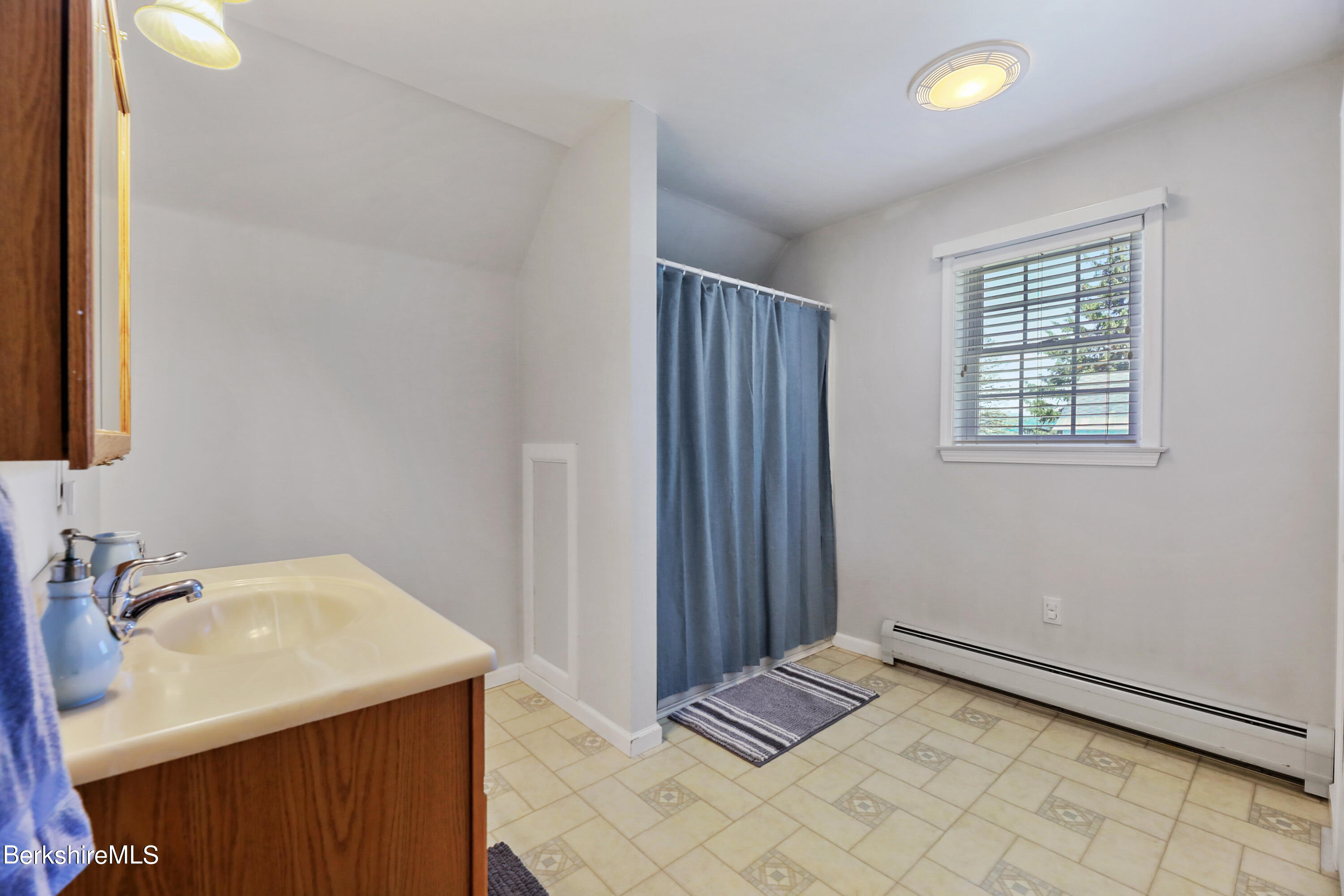 144 East Road Adams, MA 01220 - Photo 36 of 72 a bathroom with a sink and a mirror