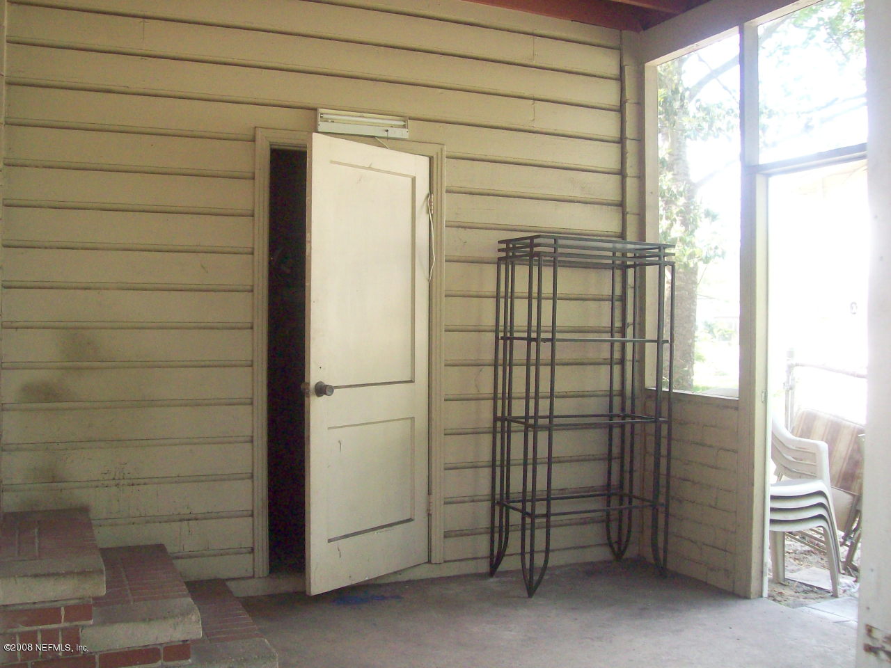 7033 May Apple Road Jacksonville, FL 32211 - Photo 15 of 19 screened patio with laundry room
