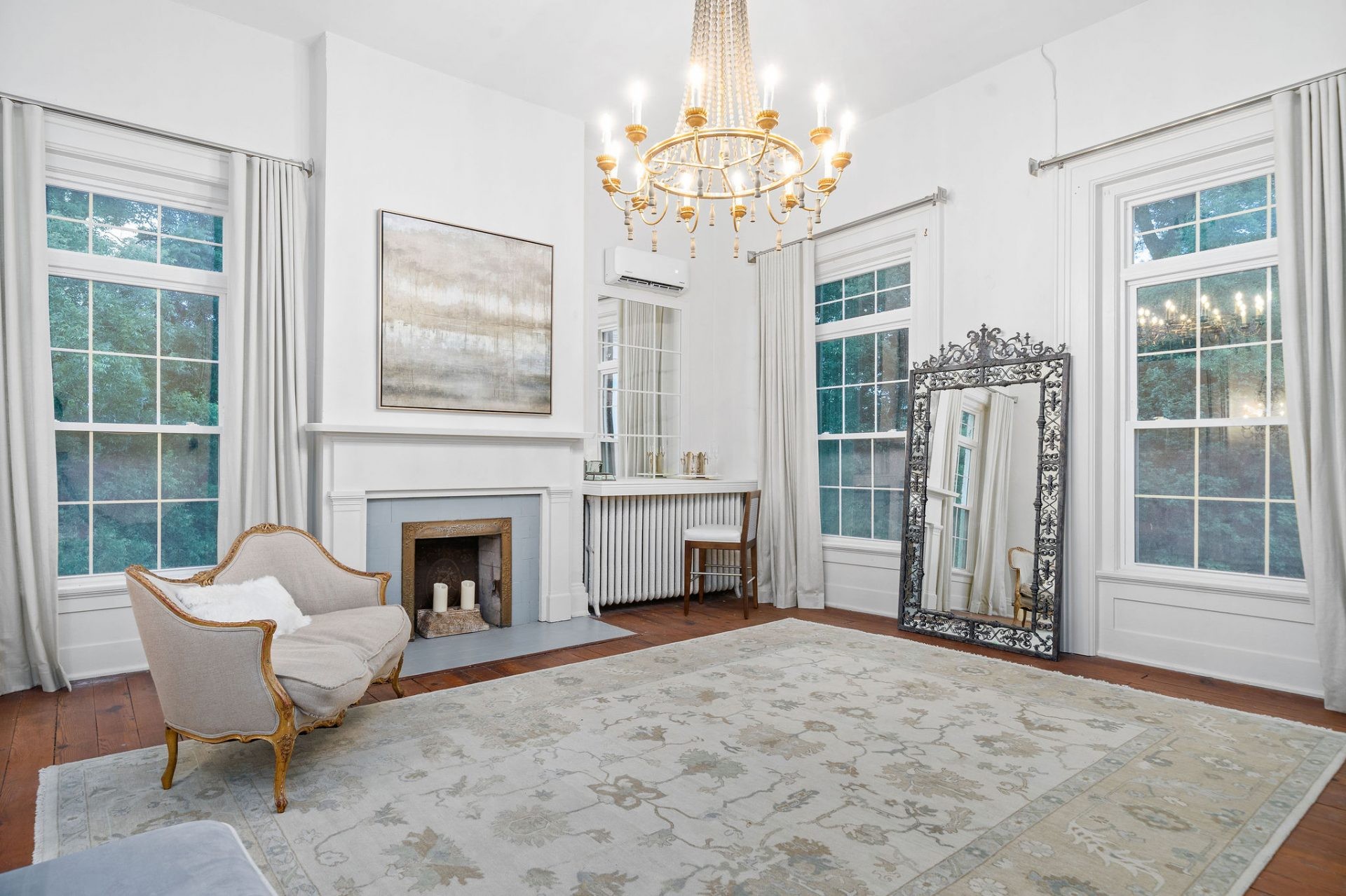 2130 Fairground Road Guthrie, KY 42234 - Photo 28 of 44 a living room with furniture a chandelier and a fireplace