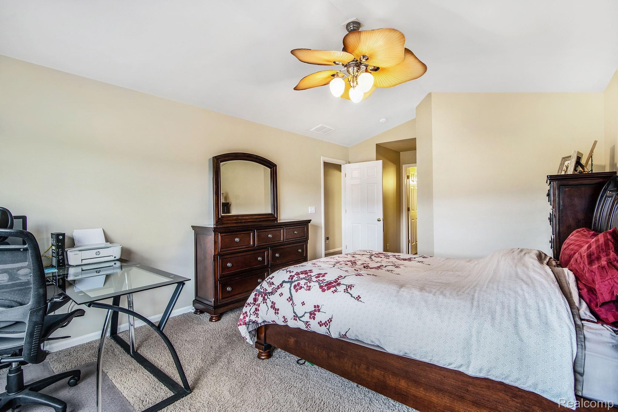 1123 Rial Lake Drive Howell, MI 48843 - Photo 10 of 19 Master Bedroom Suite with large walk in closet, master bathroom and vaulted ceiling