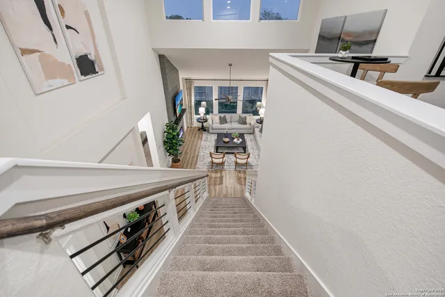 a view of a living room filled with furniture