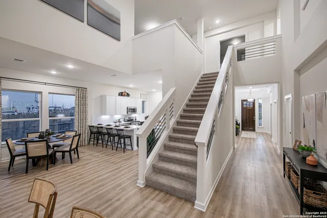 a view of a livingroom with furniture and wooden floor