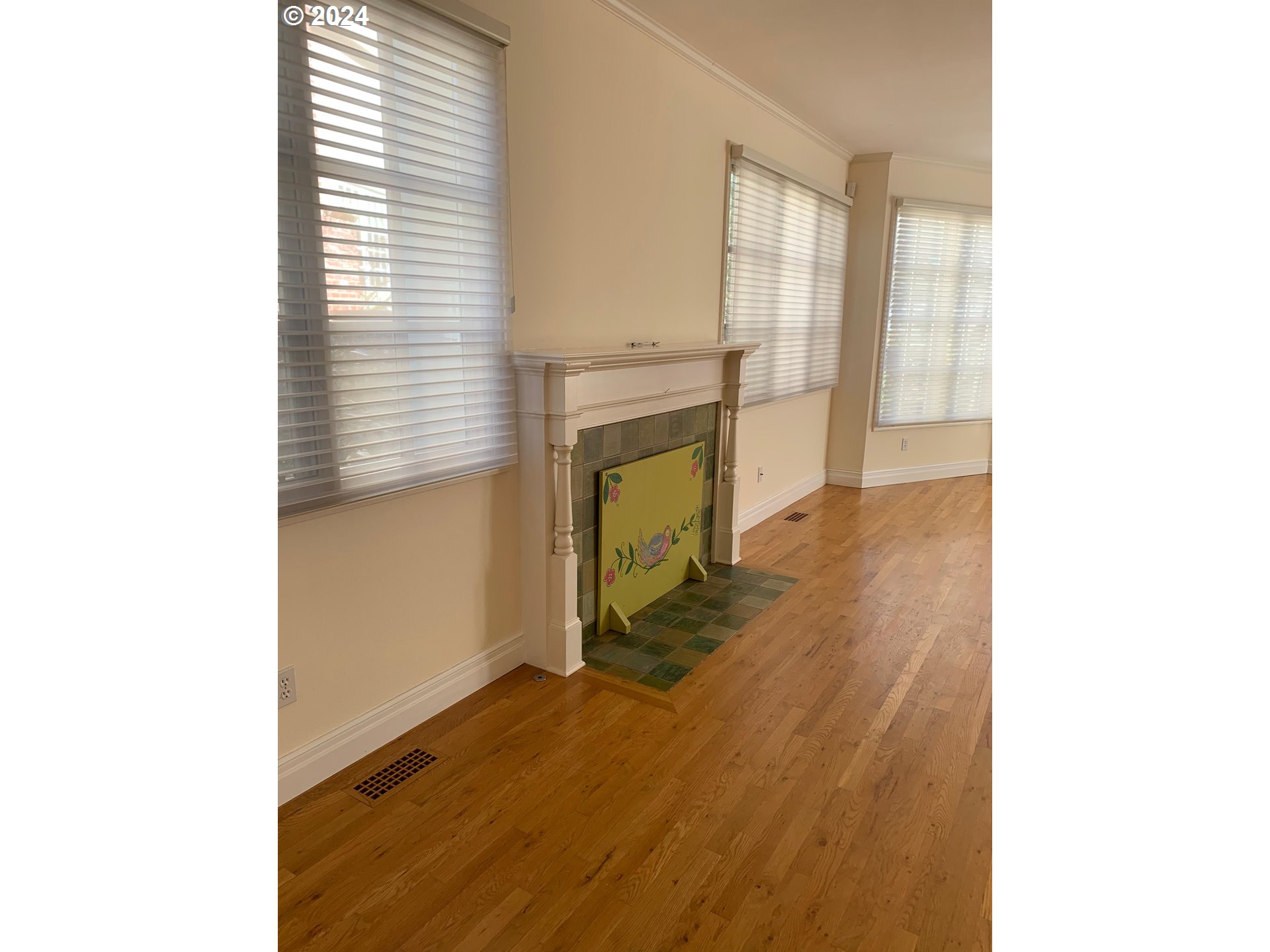 9916 Northwest Abbey Road Portland, OR 97229 - Photo 11 of 48 a view of a room with wooden floor and a window