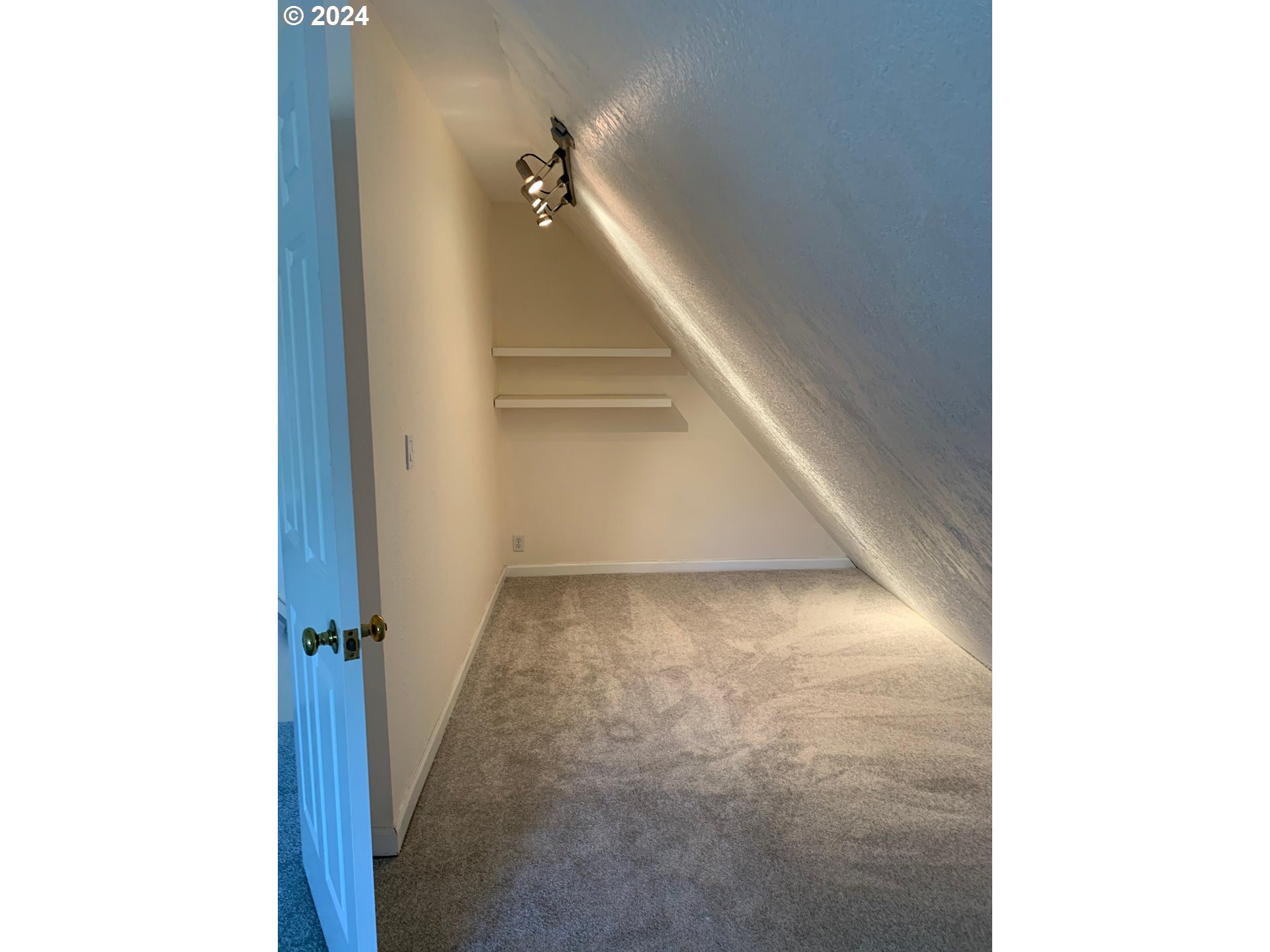 9916 Northwest Abbey Road Portland, OR 97229 - Photo 30 of 48 a view of an empty room