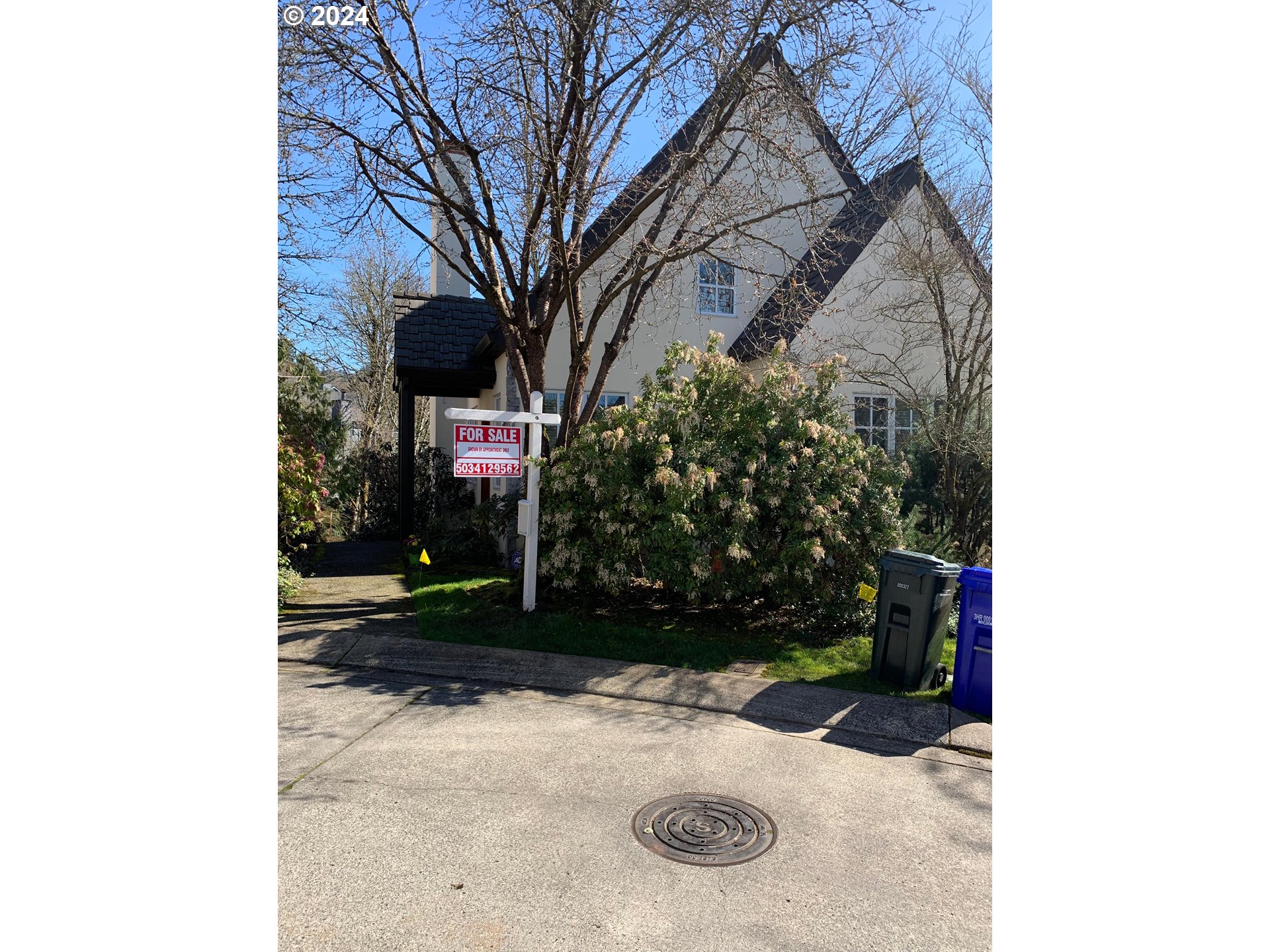 9916 Northwest Abbey Road Portland, OR 97229 - Photo 3 of 48 a view of bushes and pathway
