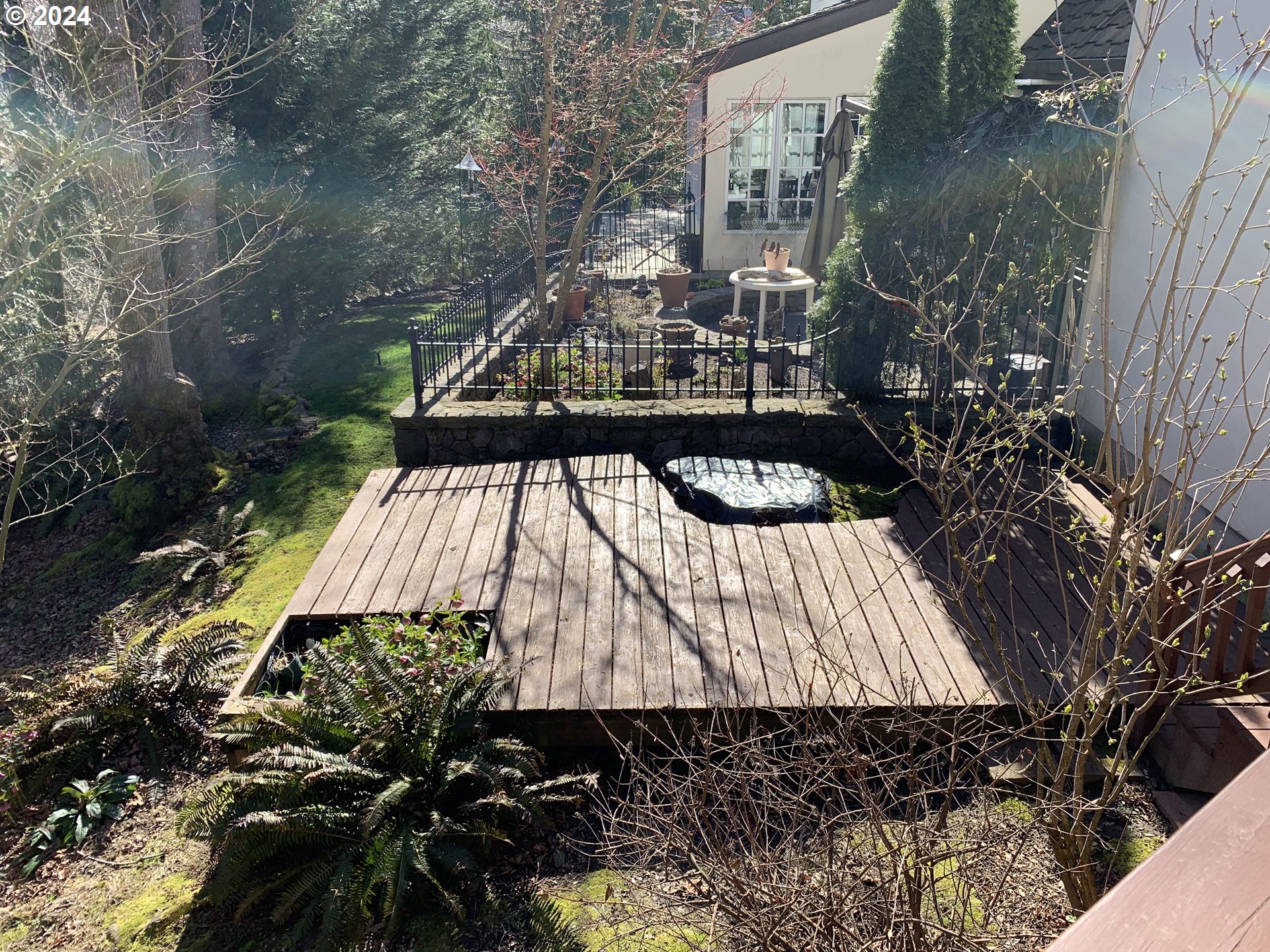 9916 Northwest Abbey Road Portland, OR 97229 - Photo 41 of 48 a view of balcony with wooden floor