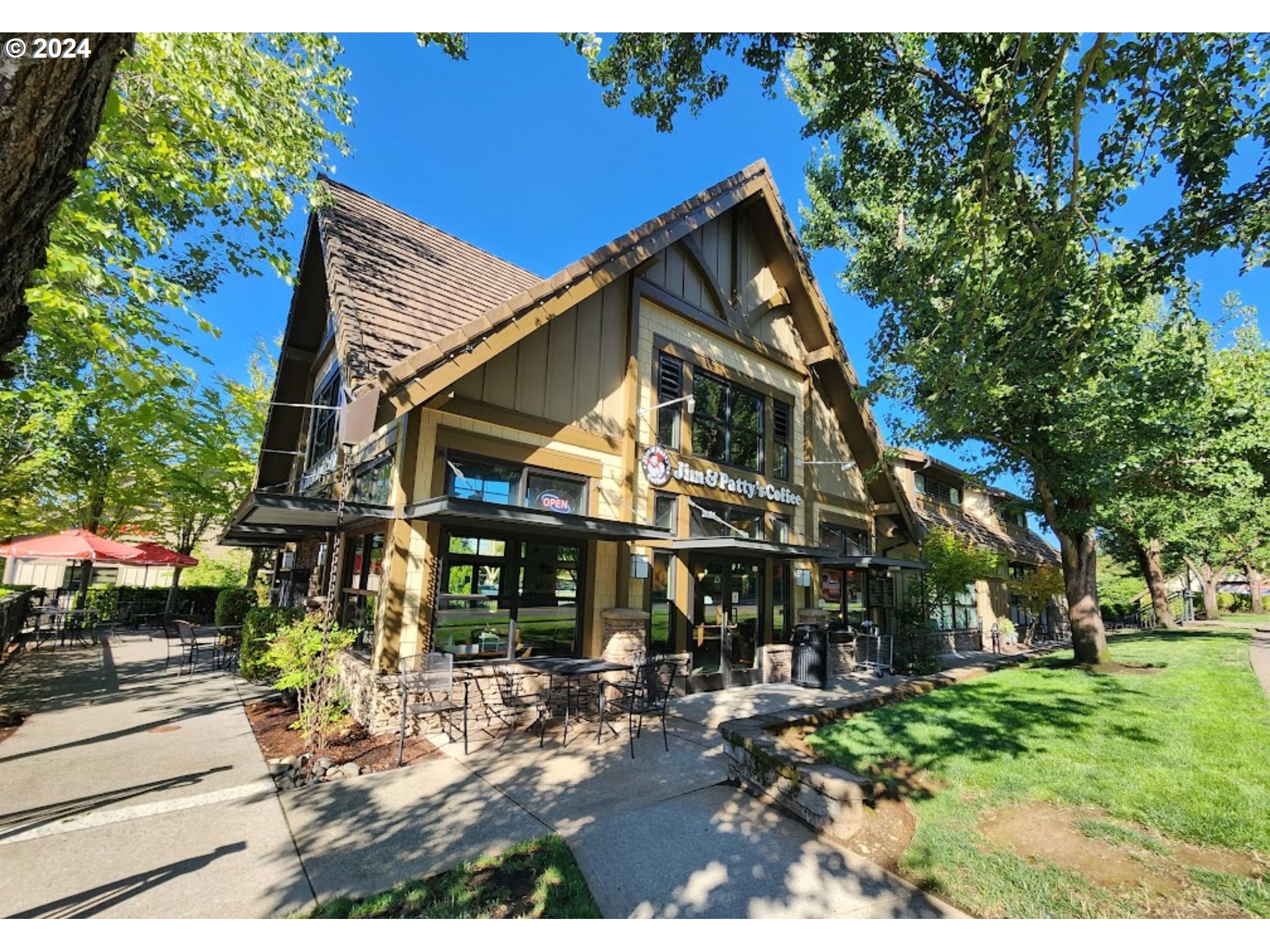 9916 Northwest Abbey Road Portland, OR 97229 - Photo 46 of 48 a view of a house with a yard