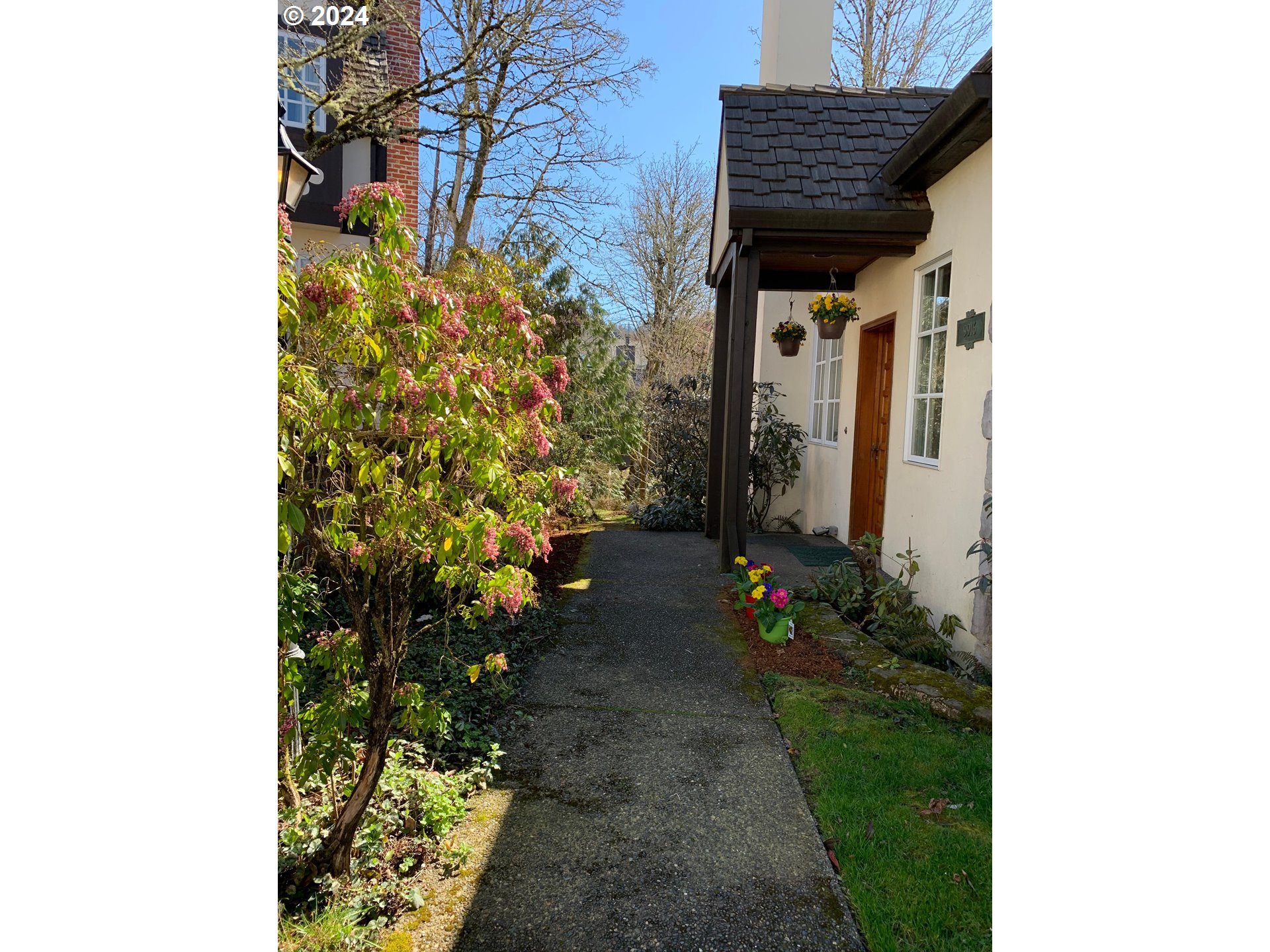 9916 Northwest Abbey Road Portland, OR 97229 - Photo 5 of 48 a view of a house with a yard