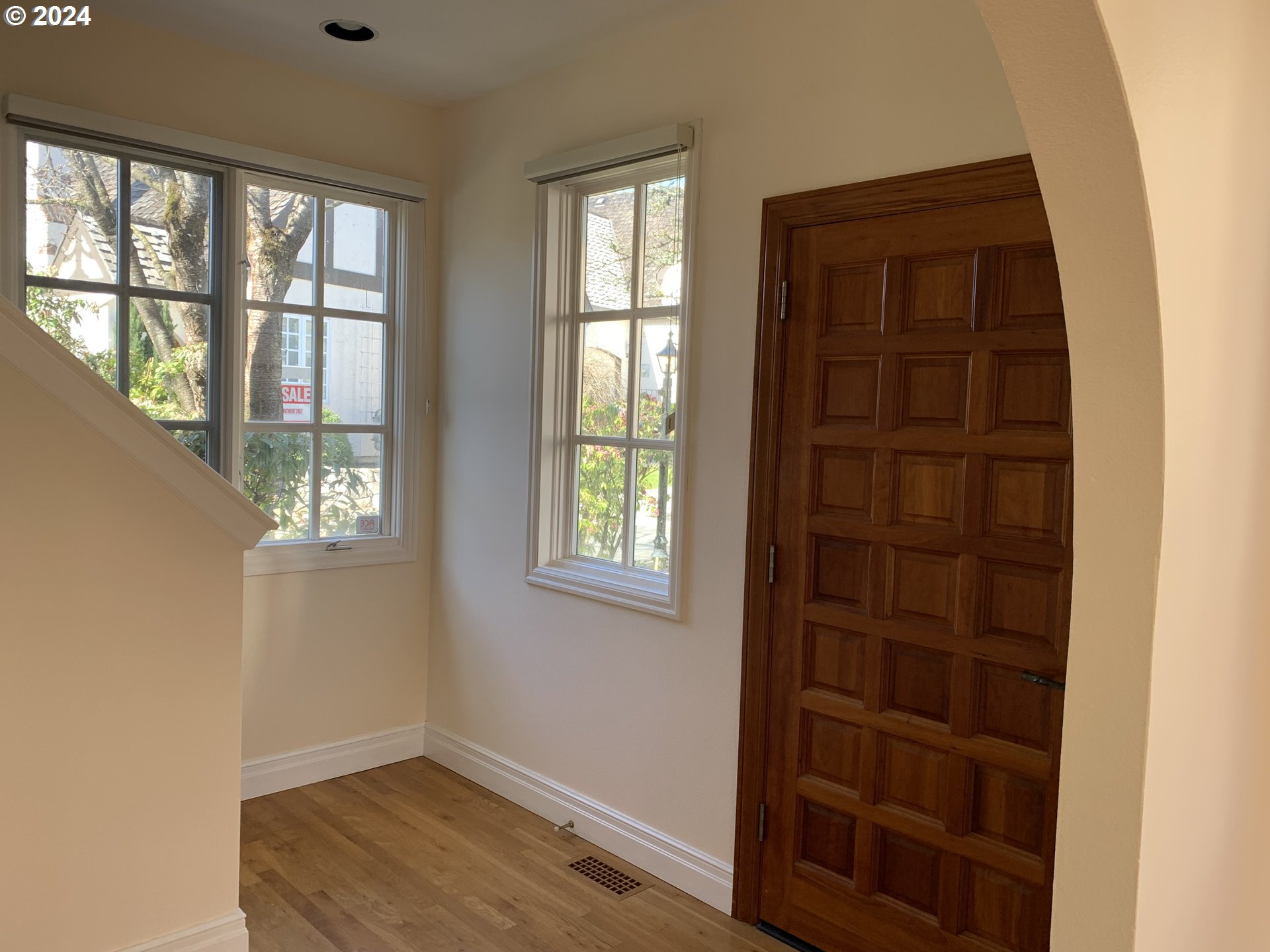 9916 Northwest Abbey Road Portland, OR 97229 - Photo 9 of 48 an empty room with windows