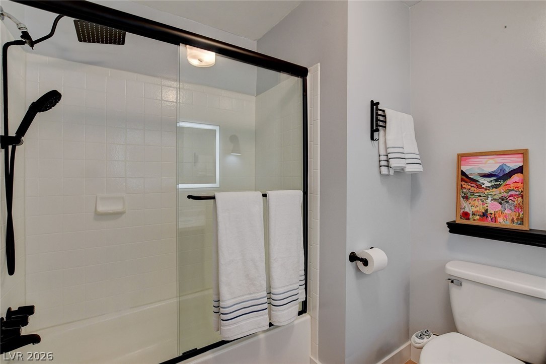 3765 Berkeley Street Logandale, NV 89021 - Photo 35 of 87 This clean and inviting bathroom features a convenient shower-tub combination with sleek fixtures.