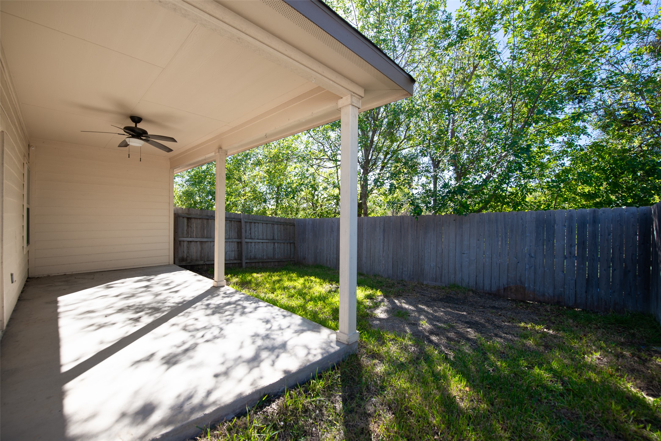 245 Joanne Loop, Unit B Buda, TX 78610 - Photo 29 of 33 Rear patio off of primary bedroom