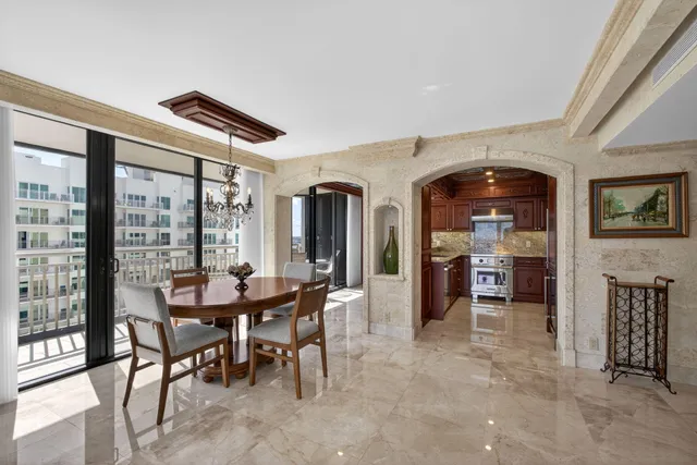 a open kitchen with sink a counter top space and dining table