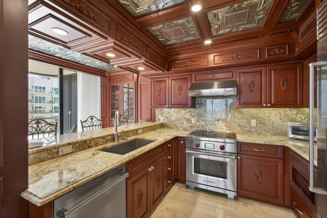 a bedroom with a large bed and a large window