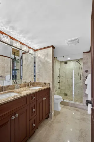 a view of a patio with a table chairs and a backyard