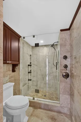 a view of a balcony with wooden stairs