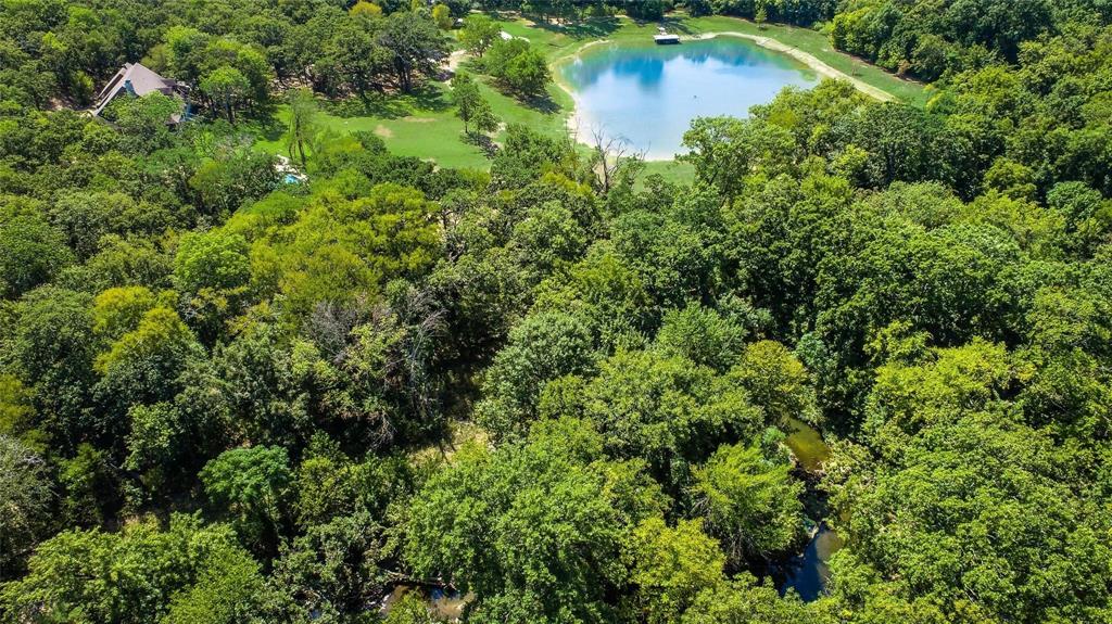 3325 Creek Road Keller, TX 76248 - Photo 15 of 28 an aerial view of residential house with outdoor space and trees all around