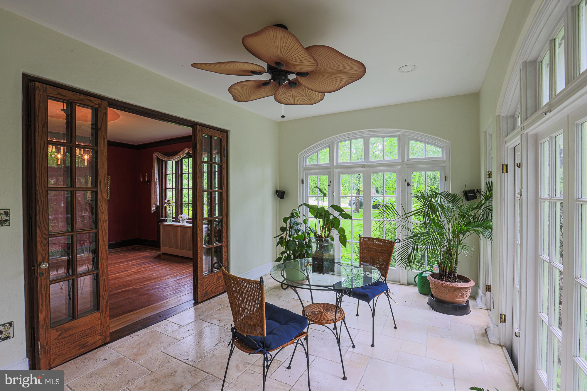 502 Woodside Road Baltimore, MD 21229 - Photo 8 of 37 sunroom leading to dining room