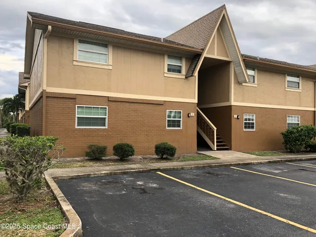 a view of a house with a street