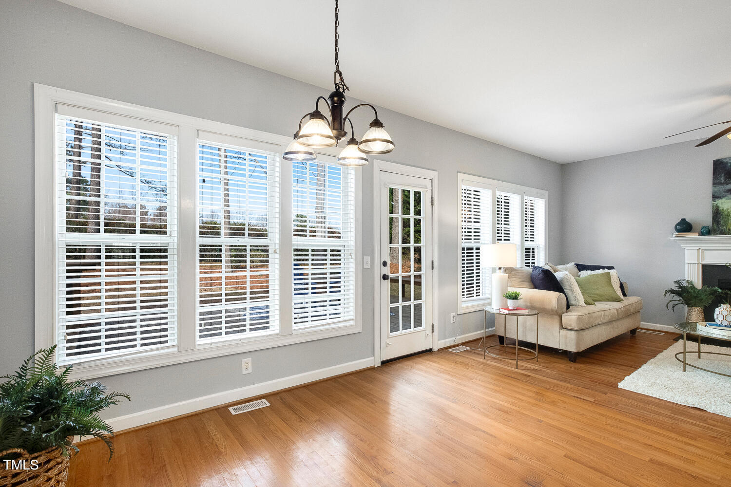 6324 Nowell Pointe Drive Raleigh, NC 27607 - Photo 17 of 50 a view of livingroom with furniture wooden floor and windows