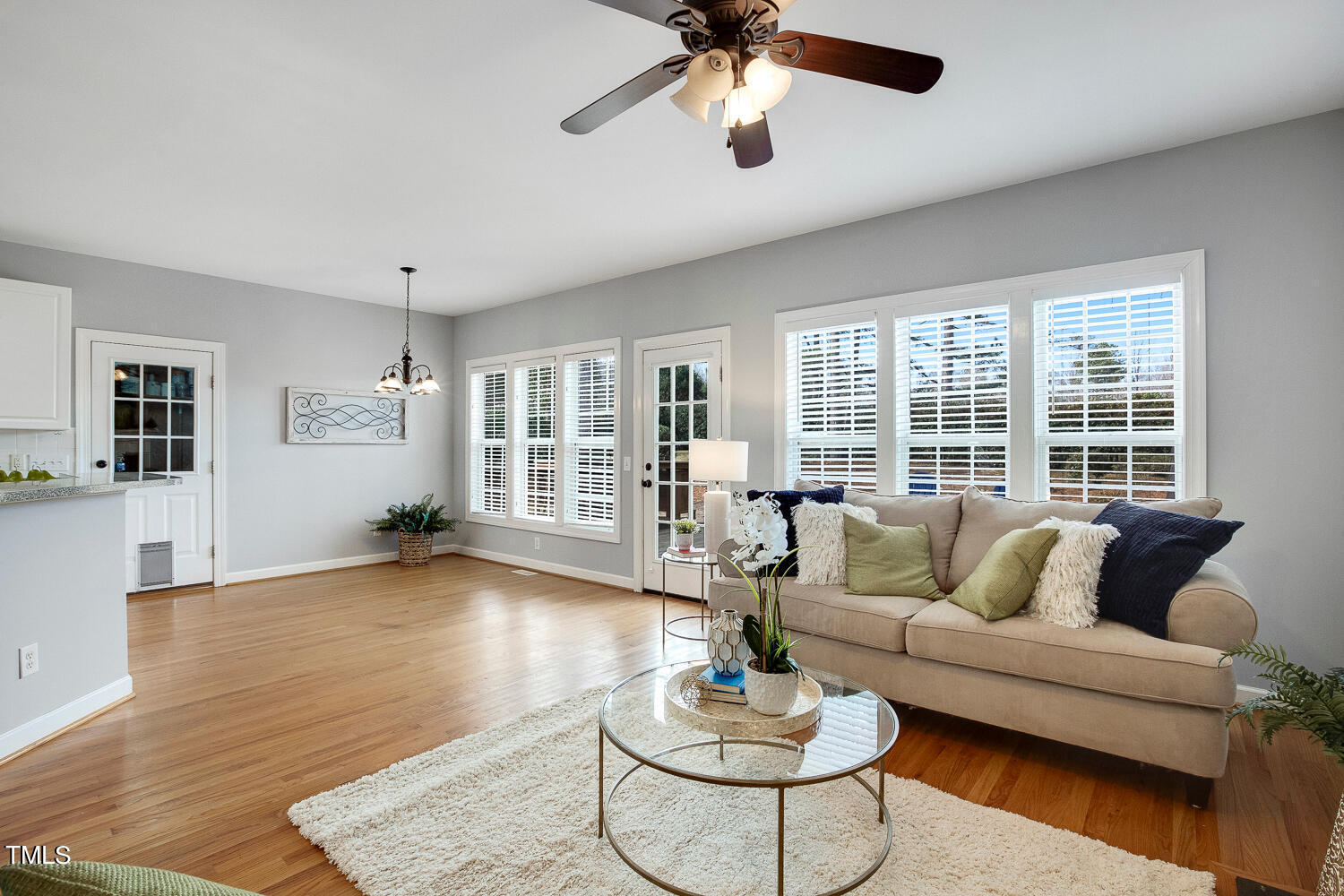 6324 Nowell Pointe Drive Raleigh, NC 27607 - Photo 18 of 50 a living room with furniture and a large window
