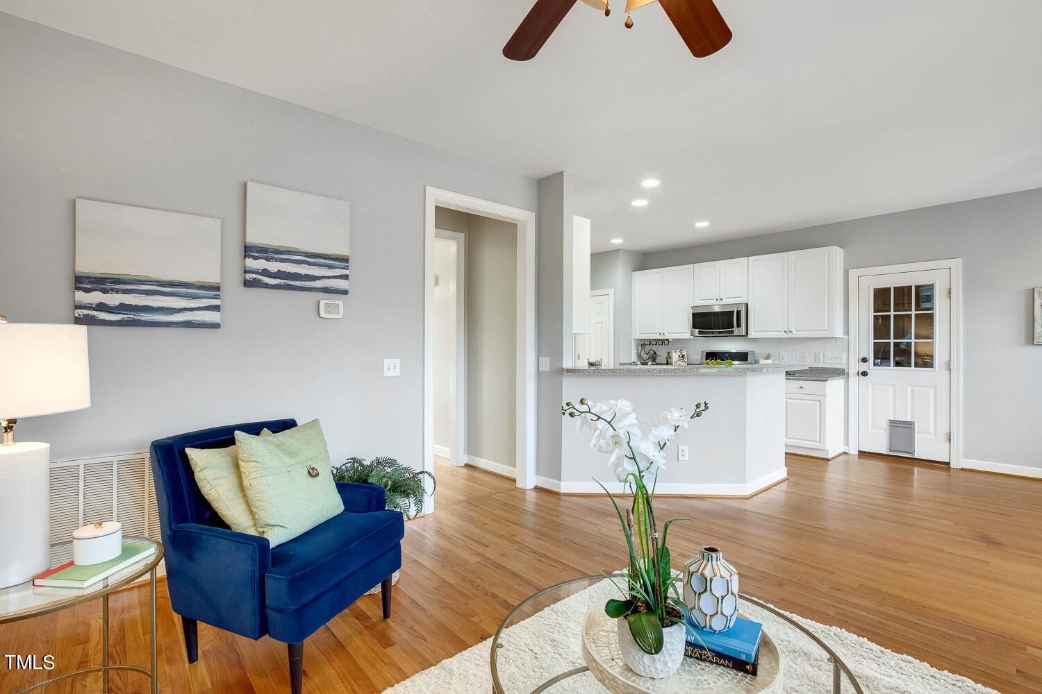 6324 Nowell Pointe Drive Raleigh, NC 27607 - Photo 19 of 50 a living room with furniture and kitchen view