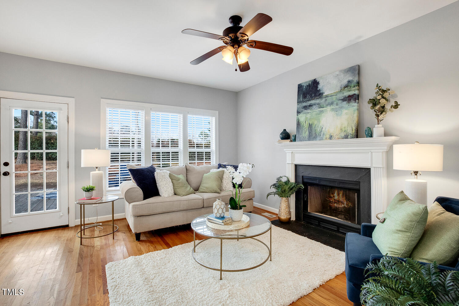 6324 Nowell Pointe Drive Raleigh, NC 27607 - Photo 20 of 50 a living room with furniture and a fireplace