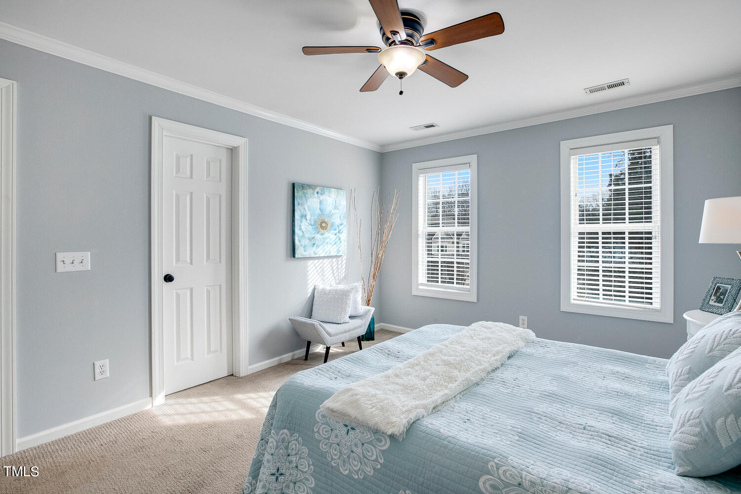 6324 Nowell Pointe Drive Raleigh, NC 27607 - Photo 26 of 50 a bedroom with a large bed and a window