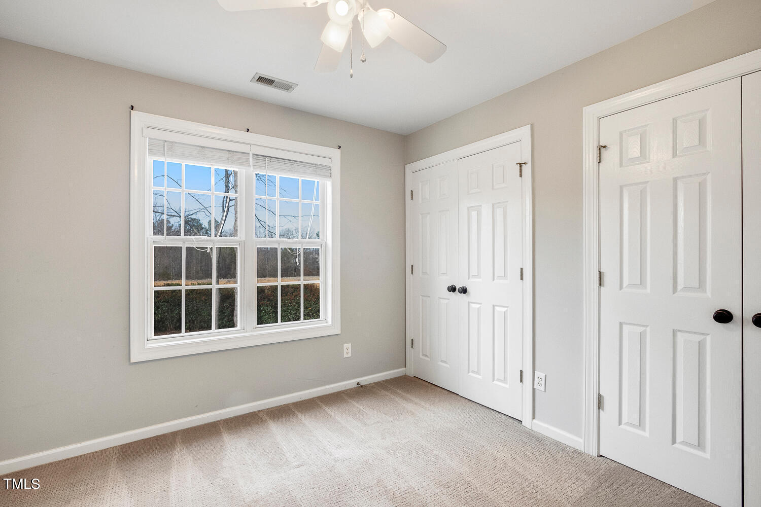 6324 Nowell Pointe Drive Raleigh, NC 27607 - Photo 31 of 50 a view of empty room with windows