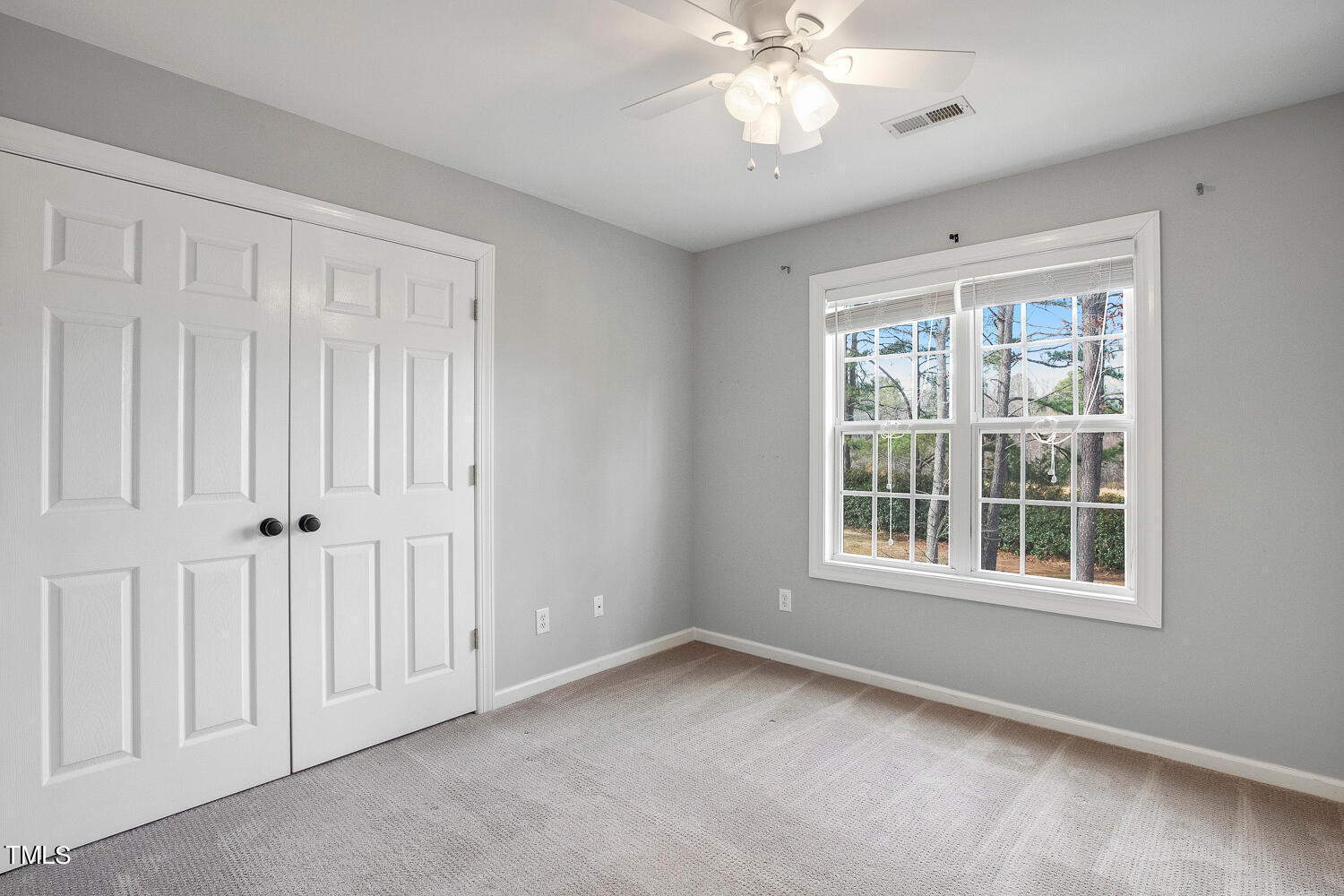 6324 Nowell Pointe Drive Raleigh, NC 27607 - Photo 34 of 50 a view of an empty room with a window