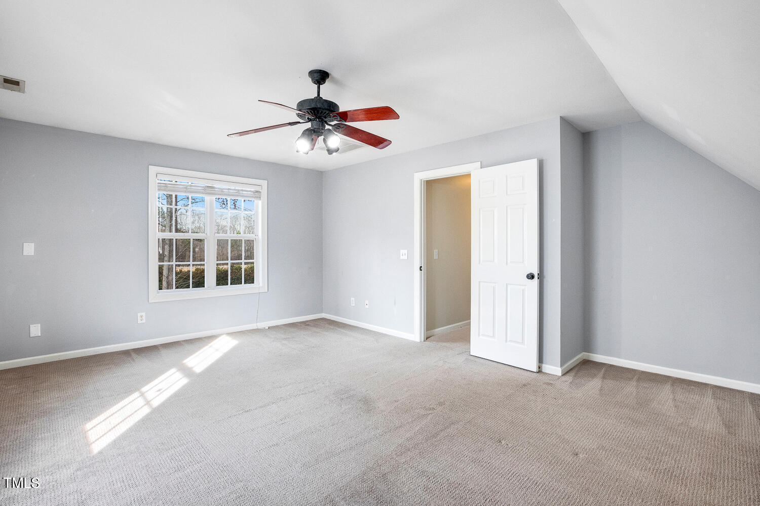 6324 Nowell Pointe Drive Raleigh, NC 27607 - Photo 37 of 50 a view of an empty room with a window