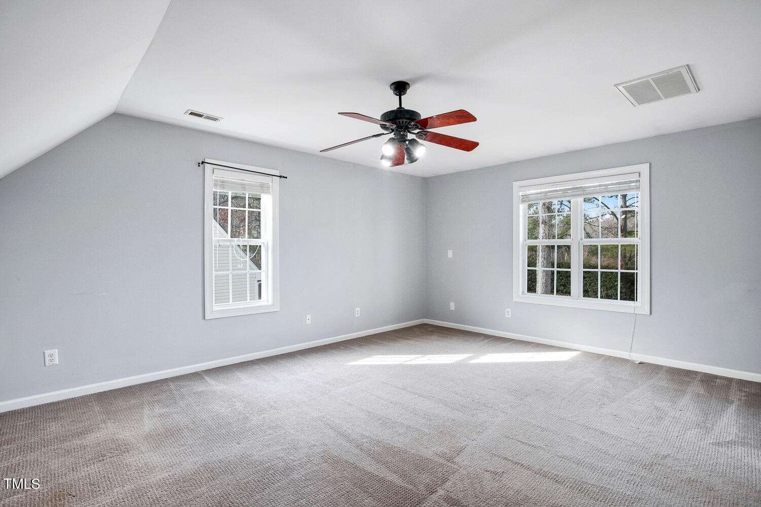 6324 Nowell Pointe Drive Raleigh, NC 27607 - Photo 38 of 50 a view of an empty room with a window