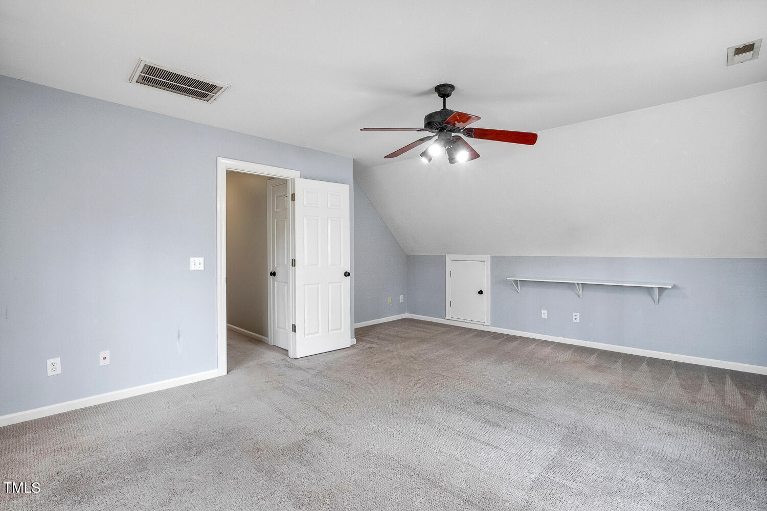 6324 Nowell Pointe Drive Raleigh, NC 27607 - Photo 40 of 50 a view of a room with a ceiling fan