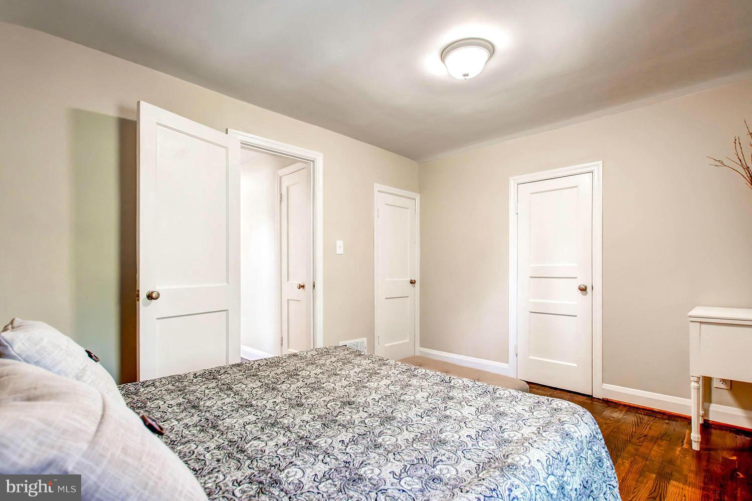 609 Cylburn Road Baltimore, MD 21208 - Photo 16 of 30 a bedroom with a bed and a window
