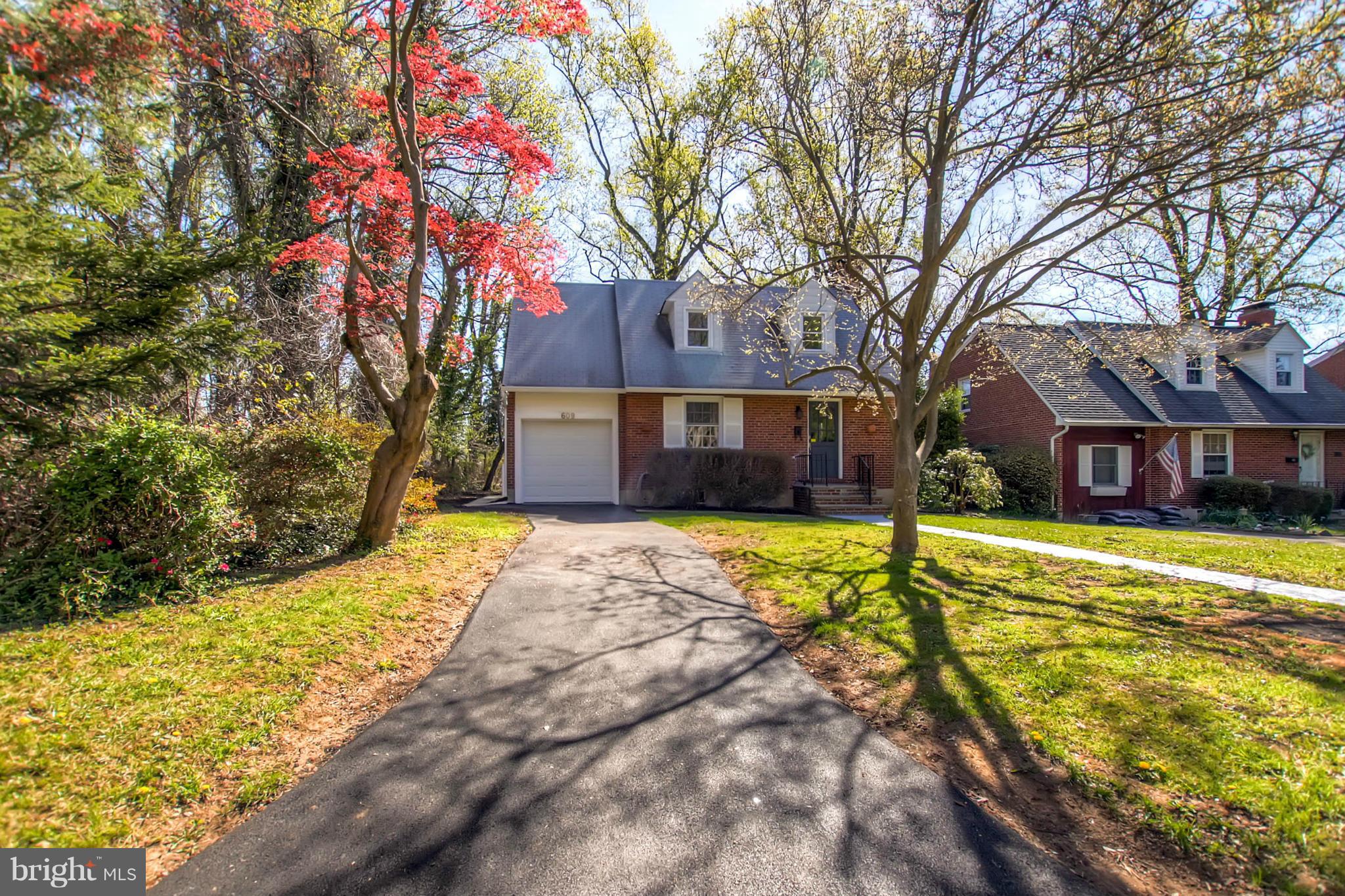 609 Cylburn Road Baltimore, MD 21208 - Photo 23 of 30 a front view of a house with a yard