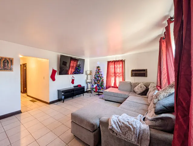a living room with furniture and a couch