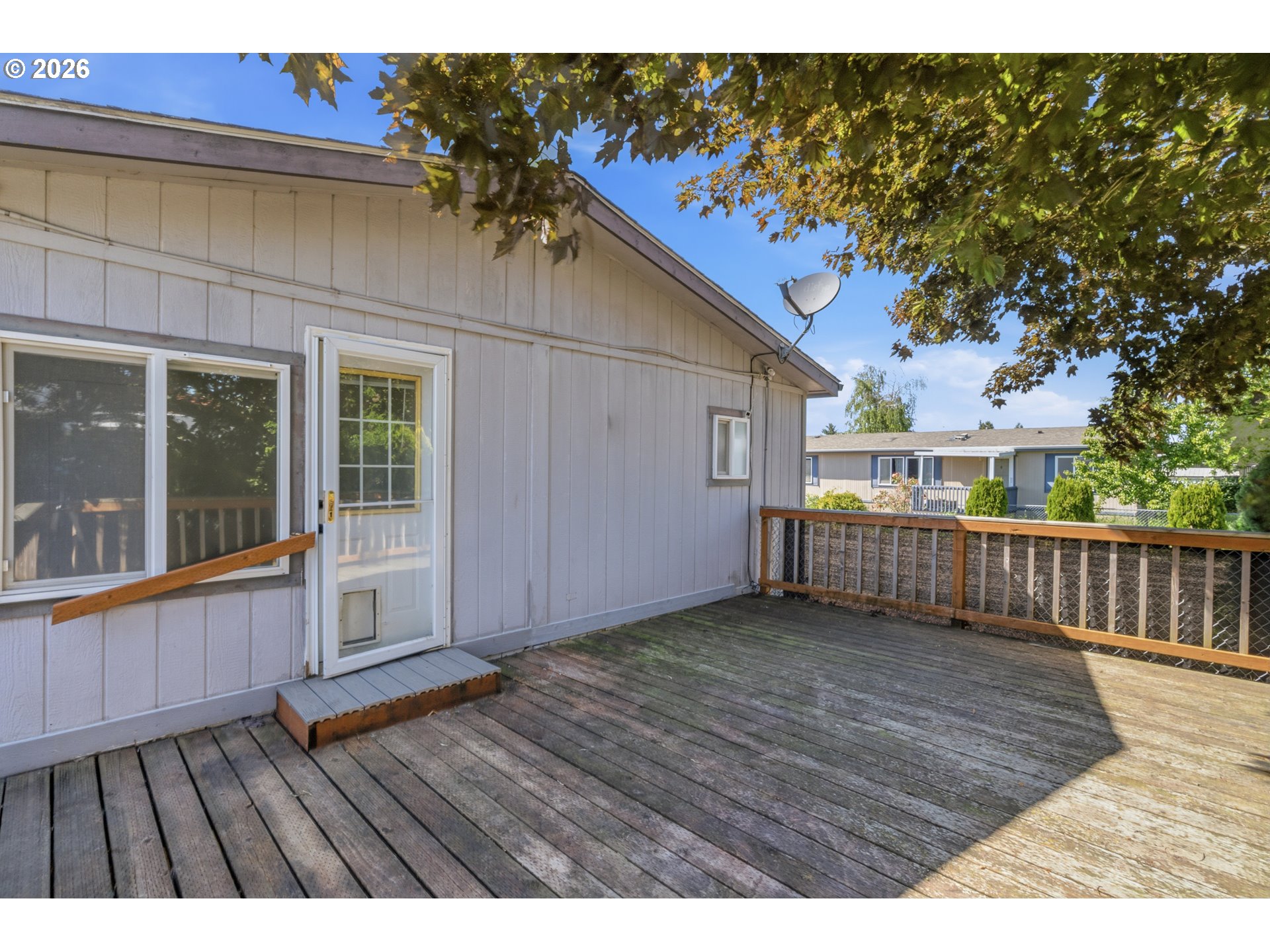 2151 Three Lakes Road Southeast Albany, OR 97322 - Photo 23 of 25 a view of backyard with deck and wooden floor