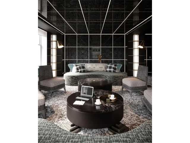 a view of a workspace with furniture and a window