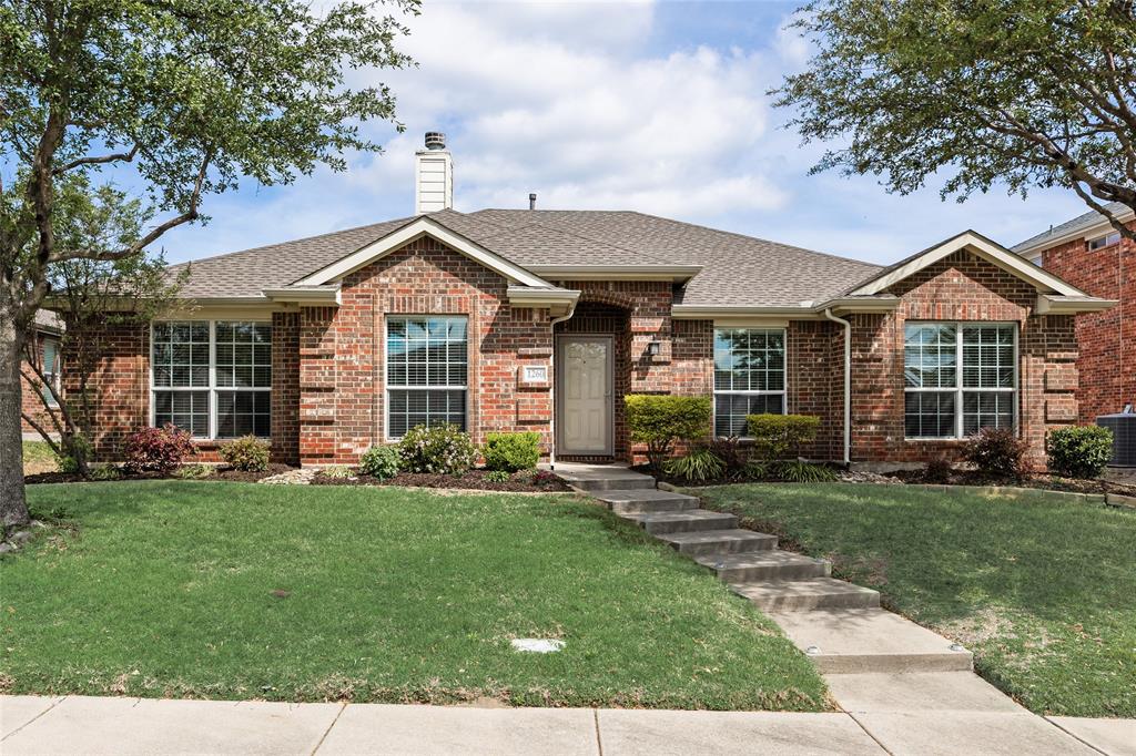 1260 Highbluff Lane Rockwall, TX 75087 - Photo 1 of 22 a front view of a house with a yard