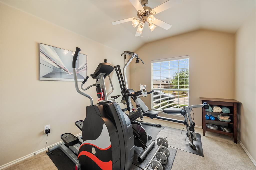 1260 Highbluff Lane Rockwall, TX 75087 - Photo 17 of 22 a view of a room with gym equipment